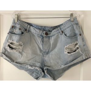 Distressed light-wash denim shorts
